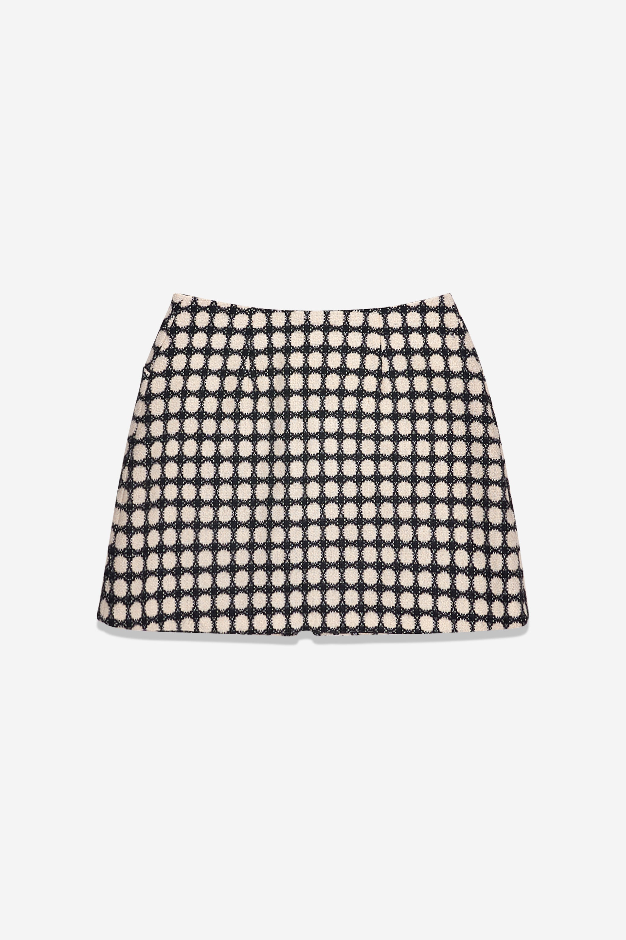 Jupe noire à pois blancs