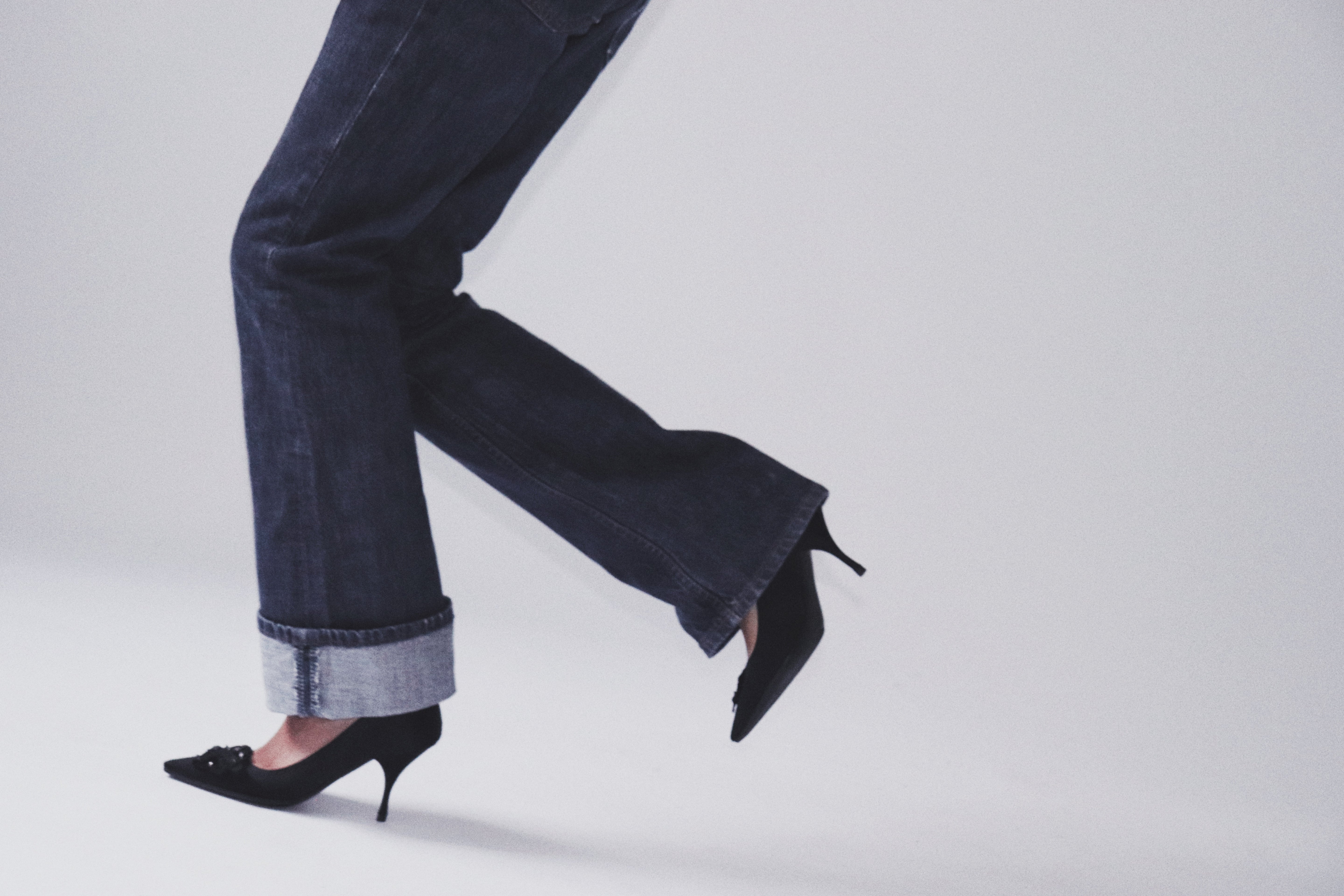 Black satin pumps