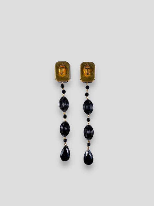 Long gold and black Tarlazzi clips