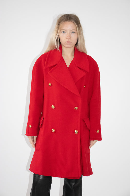 Red coat with gold buttons